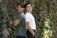 TikTok personalities Ian Paget, left, and Chris Olsen pose for a portrait in West Hollywood, Calif. on Oct. 20, 2020. Paget and Olsen, gay partners in Los Angeles, have amassed more than 4 million followers who love and encourage them as they hunker down at home, churning out goofy dance videos and playing the constant pranks that are stock-in-trade on TikTok. (AP Photo/Chris Pizzello)