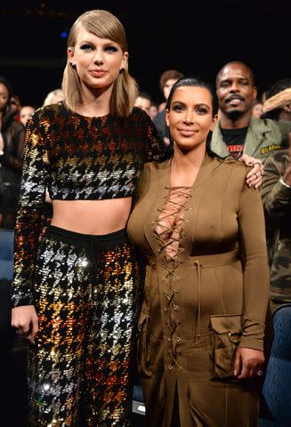 <p>Kevin Mazur/MTV1415/WireImage</p> Taylor Swift and Kim Kardashian in 2015.