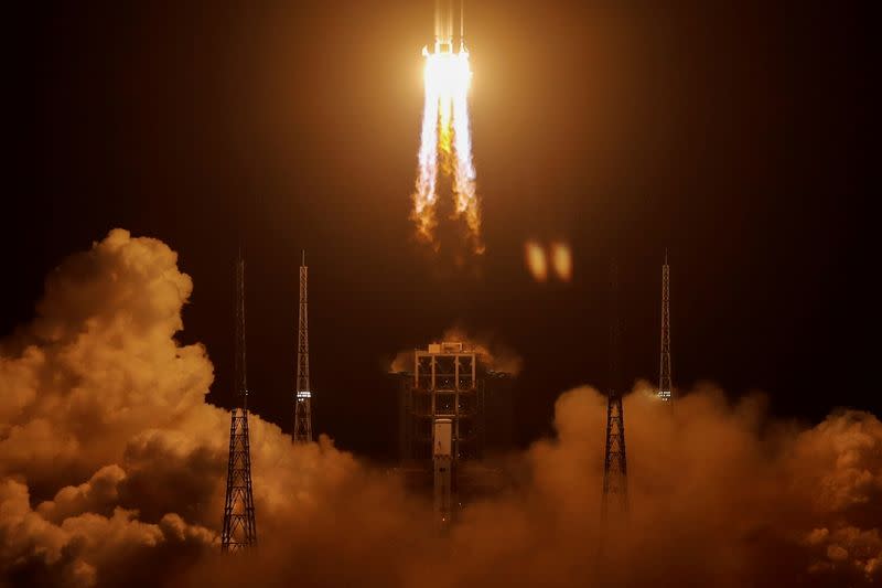 The Long March-5 Y5 rocket, carrying the Chang'e-5 lunar probe, takes off from Wenchang Space Launch Center, in Wenchang