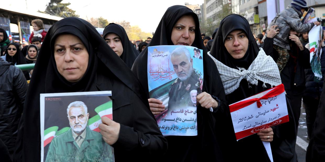 Mourners holding posters of Iranian Gen. Qassem Soleimani attend a funeral ceremony for him and his comrades, who were killed in Iraq in a U.S. drone strike on Friday, at the Enqelab-e-Eslami (Islamic Revolution) Square in Tehran, Iran, Monday, Jan. 6, 2020. The processions mark the first time Iran honored a single man with a multi-city ceremony. Not even Ayatollah Ruhollah Khomeini, who founded the Islamic Republic, received such a processional with his death in 1989. Soleimani on Monday will lie in state at Tehran's famed Musalla mosque as the revolutionary leader did before him. (AP Photo/Ebrahim Noroozi)