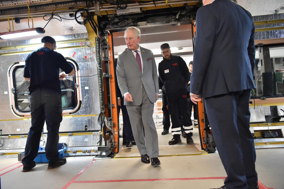 The Prince of Wales onboard a train being constructed during a visit to the CAF train factory in Newport, Wales.