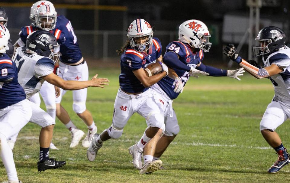 Modesto Christian’s Gabe Pires runs the ball during the nonleague game with Stone Ridge Christian at Modesto Christian High School in Salida, Calif., Friday, Sept. 15, 2023.