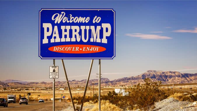 Royalty-free stock photo ID: 379886149 PAHRUMP, NEVADA - JANUARY 31: Traffic passes a welcome to Pahrump sign in Pahrump, Nevada on January 31st, 2016.