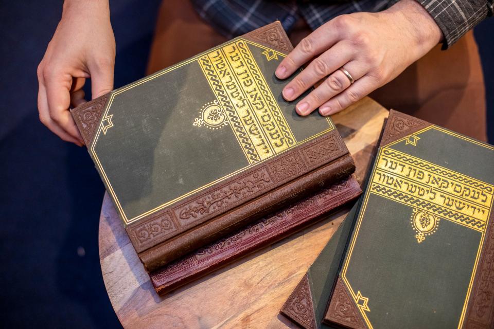 Volumes of Yiddish literature were available to be handled by visitors at the "Book Smugglers" exhibition in the Zekelman Holocaust Center last year. The exhibit told the story of people who hid Jewish books and documents the Nazis sought to destroy.