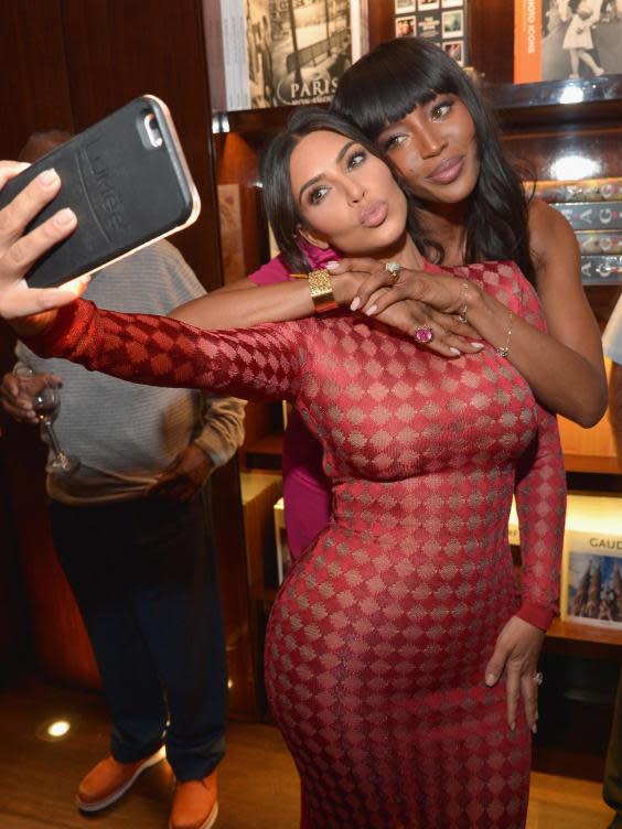 Kim Kardashian, here seen with supermodel Naomi Campbell, is famed for her selfie-taking abilities (Getty)