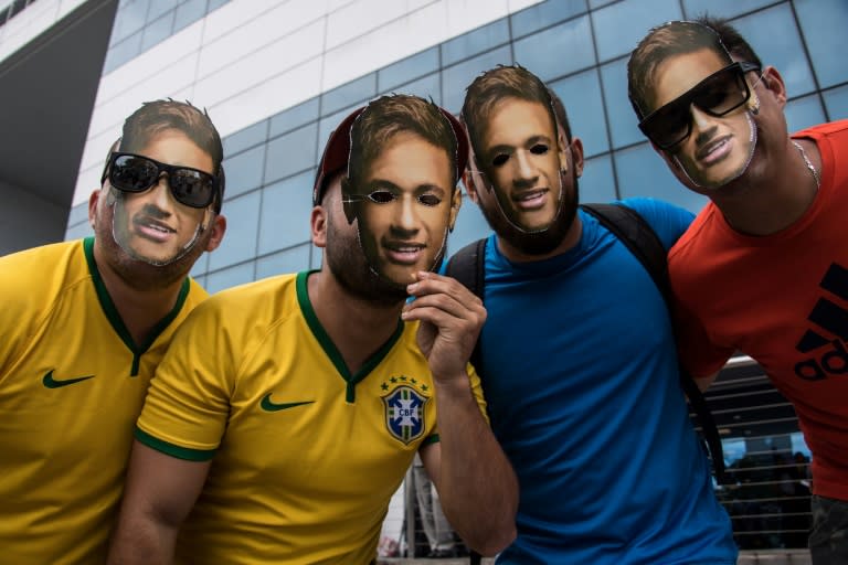 Fans wear masks of Brazil's Neymar, who is home with his famous right foot recovering from surgery as the rest of the Brazil squad prepare to face hosts Russia in their penultimate World Cup warmup