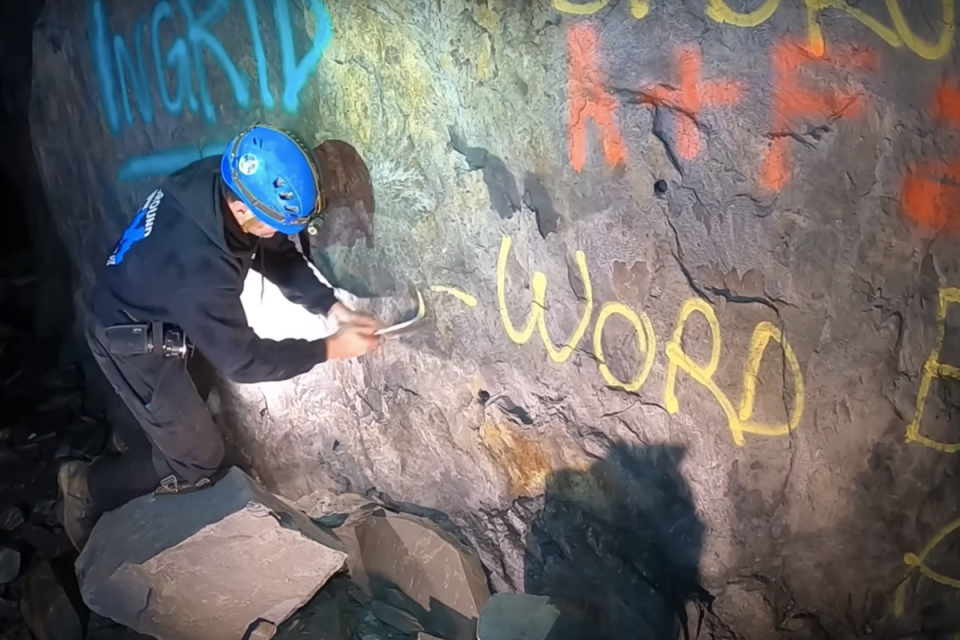 More  graffiti defacing the ‘car grave’ (Underground Explorer UK/YouTube)