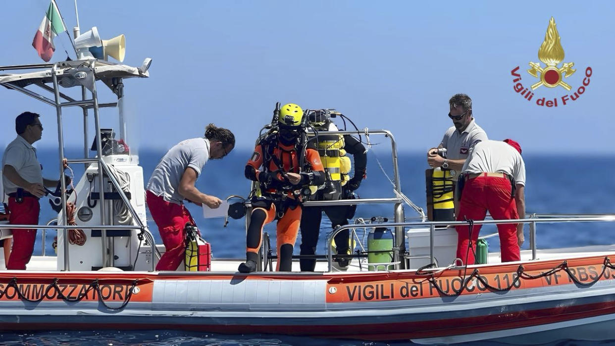 This picture released by the Italian Firefighters on Friday, Aug. 23, 2024, shows a firefighter cave diver as he prepares to reach the wrecked luxury superyacht Bayesian that sunk early Monday off the Sicilian coast in Porticciolo, in southern Italy. (Vigili del Fuoco via AP, HO)