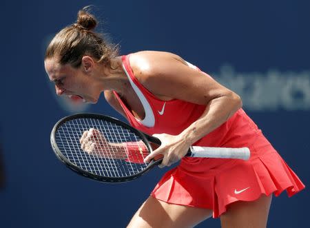 Roberta Vinci of Italy celebrates winning the second set against Serena Williams of the U.S. during their women's singles semi-final match at the U.S. Open Championships tennis tournament in New York, September 11, 2015. REUTERS/Mike Segar Picture Supplied by Action Images