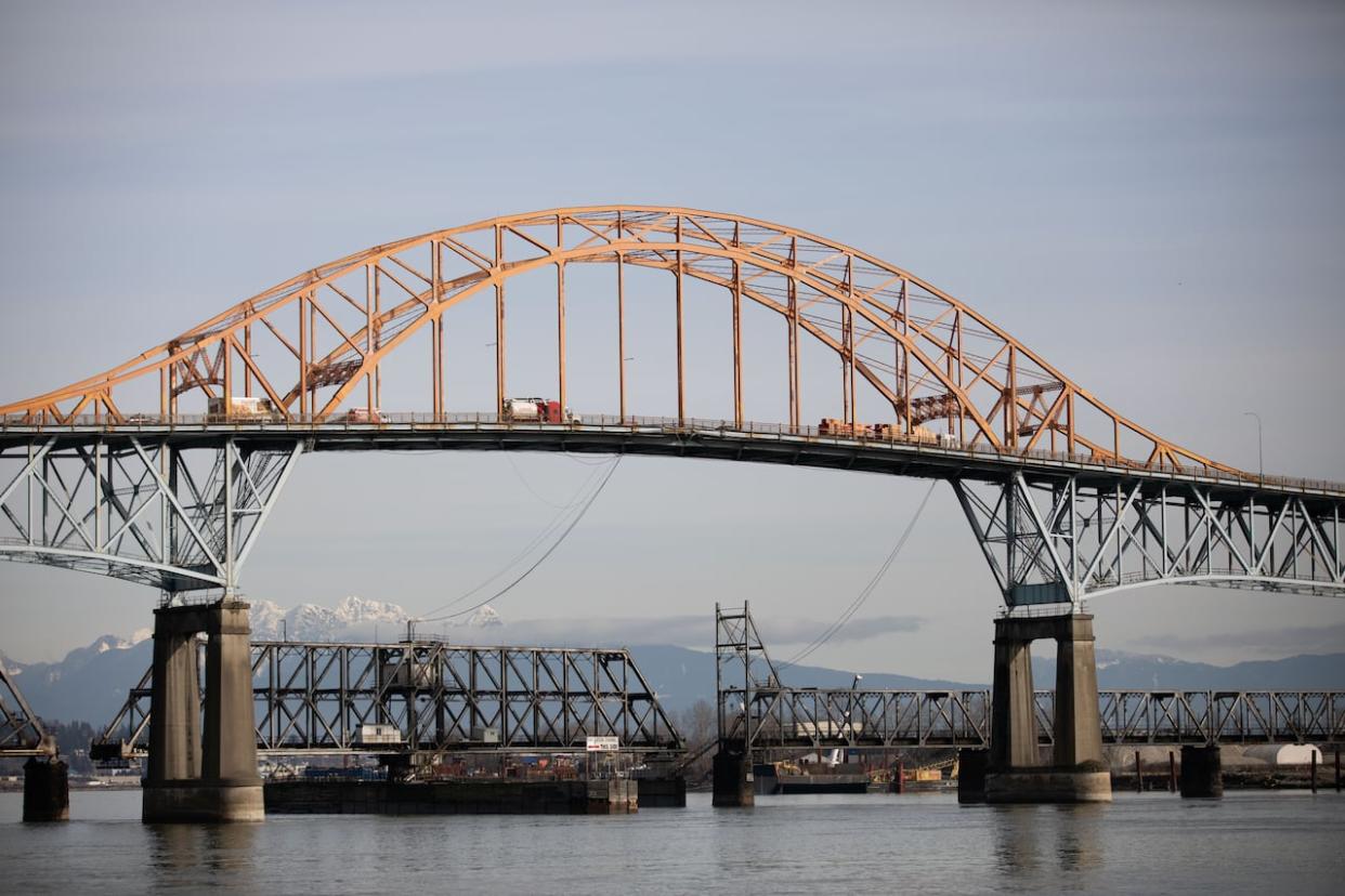 The Pattullo Bridge connecting New Westminster and Surrey is seen in February 2020. The province has announced yet another delay on the project to replace the bridge, with the new opening scheduled for fall 2025. (Maggie MacPherson/CBC - image credit)