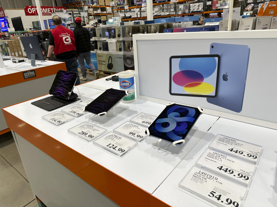 Apple iPads are displayed in a Costco warehouse Sunday, March 17, 2024, in Sheridan, Colo. On Wednesday, April 10, 2024, the Labor Department issues its report on inflation at the consumer level in March.(AP Photo/David Zalubowski)
