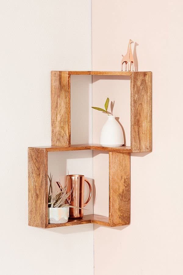 Make the most out of the space you have with <a href="https://www.urbanoutfitters.com/shop/maggie-corner-wall-shelf?category=furniture&amp;color=111" target="_blank">these innovative corner shelves</a>.