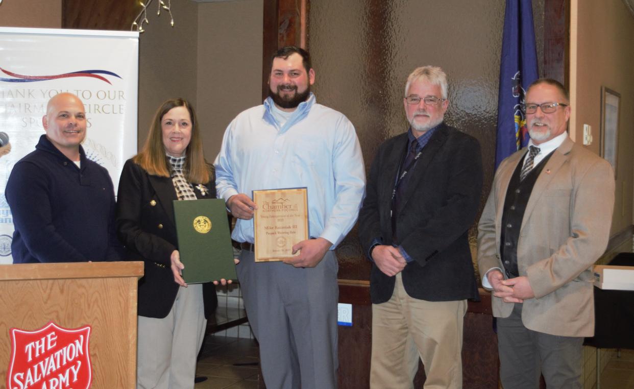 From left: Joe Regenski, board chair, Chamber of the Northern Poconos; Sen. Lisa Baker; 2023 Young Entrepreneur award recipient Mike Kuzmiak III; and Wayne County Commissioners Jim Shook and Brian Smith.