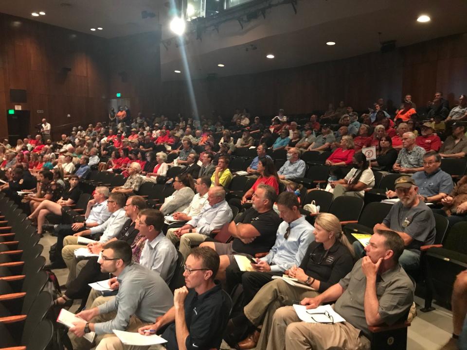 Proponents and opponents of the controversial Fountain Wind project filled the Shasta College theater on Tuesday, June 22, 2021.