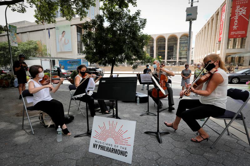 FILE PHOTO: A string quartet made up of musicians from the New York Philharmonic Orchestra play first public performance since March in New York