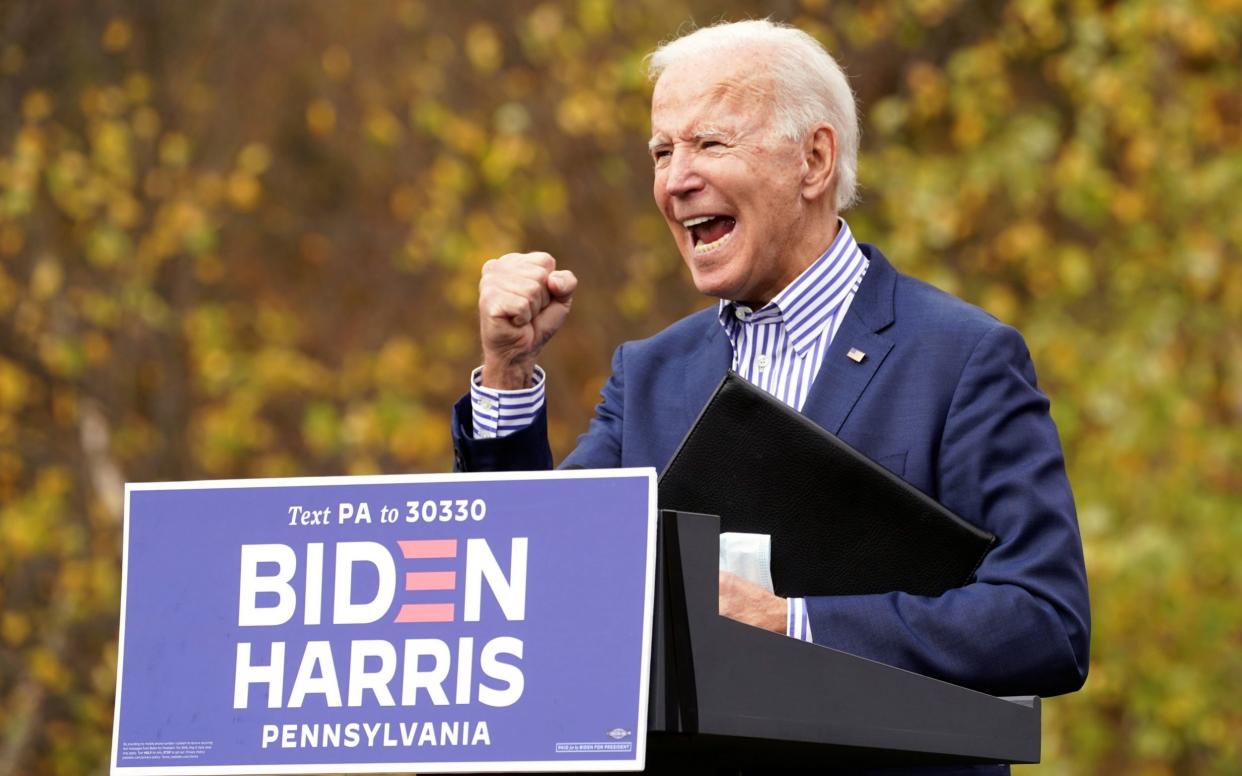 US presidential candidate Biden holds drive-in campaign event in Bristol - REUTERS
