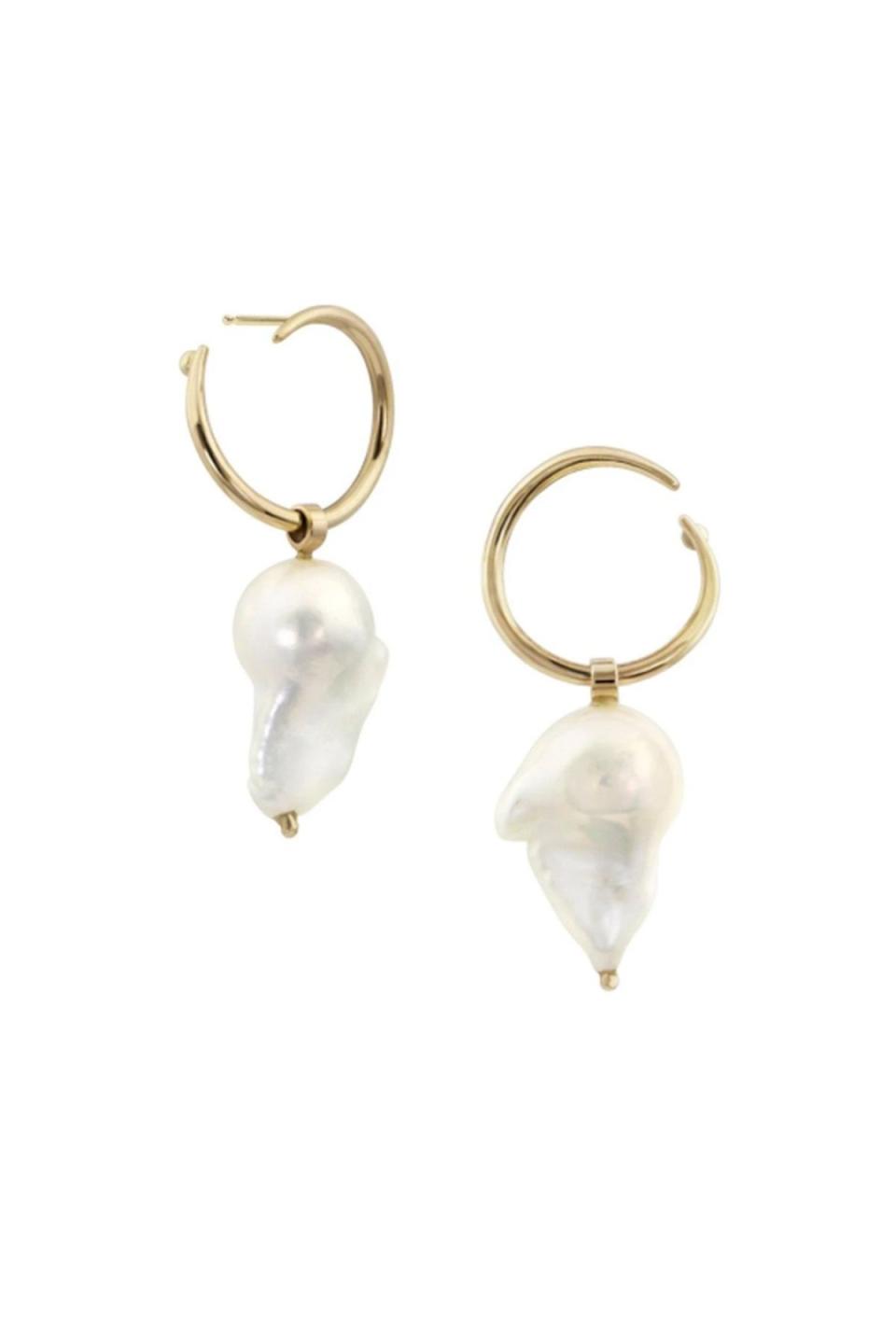 <p><strong>White Space</strong></p><p>whitespacejewelry.com</p><p><strong>$750.00</strong></p><p><a href="https://www.whitespacejewelry.com/collections/earrings/products/esme-baroque-hoop-earrings" rel="nofollow noopener" target="_blank" data-ylk="slk:Shop Now;elm:context_link;itc:0;sec:content-canvas" class="link ">Shop Now</a></p><p>These earrings will have you wondering if you are a King Charles I with one earring or full on Sir Raleigh with two. Either way, the look is pure royal. </p>