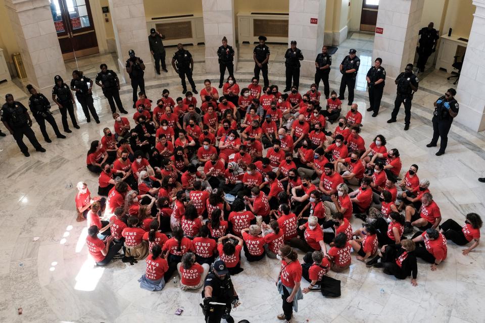 Police officers stand guard during a protest in support of Palestinians inside of the Cannon Office Building a day before Israeli Prime Minister Benjamin Netanyahu's scheduled address to Congress on July 23, 2024