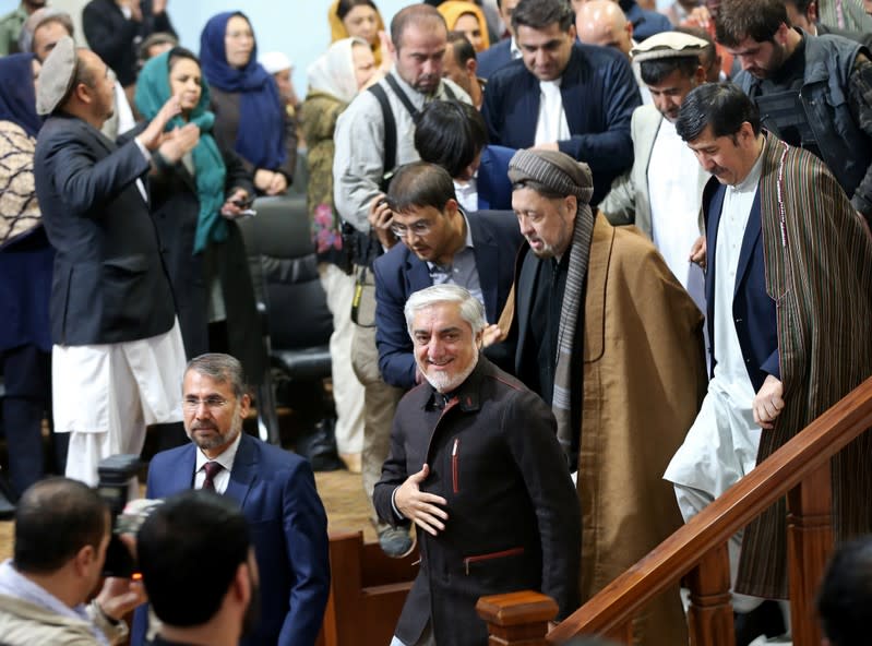 Afghanistan's presidential candidate Abdullah Abdullah arrives to attend a gathering with his supporters in Kabul