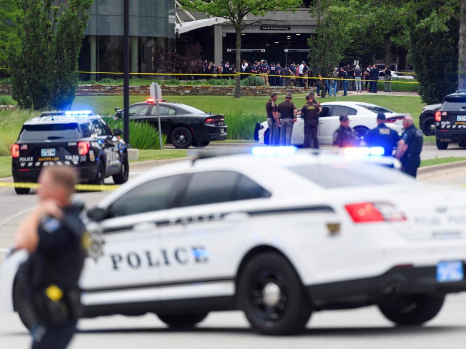 Emergency personnel work at the scene of a shooting at the Saint Francis hospital campus, in Tulsa, Oklahoma, June 1, 2022.