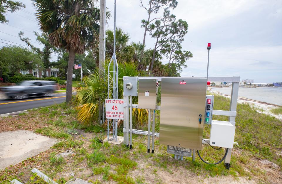 A car speeds by lift station 45 on West Beach Drive on Tuesday.