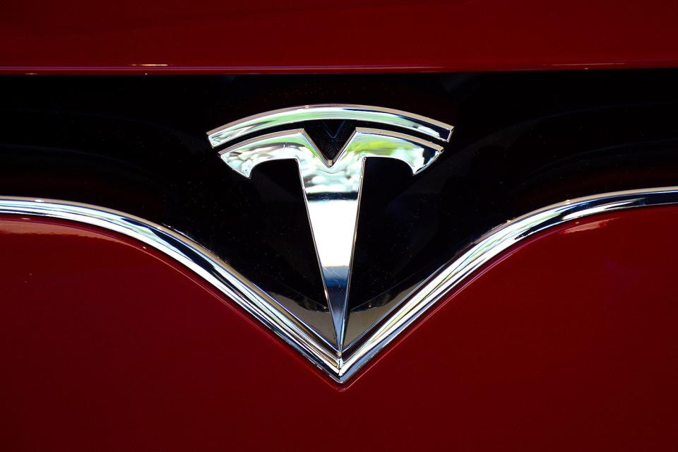 <p>Robert Alexander/Getty Images</p> Tesla logo