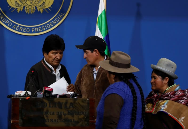 Bolivia's President Evo Morales looks on after adressing the media at the presidential hangar in the Bolivian Air Force terminal in El Alto