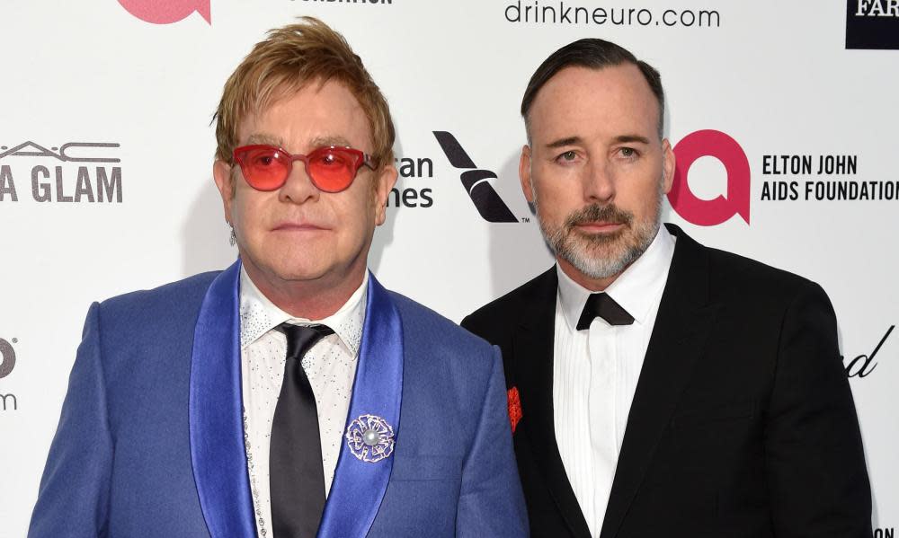 Sir Elton John and David Furnish who are on the verge of settling a high court claim over phone-hacking, a judge has been told. 