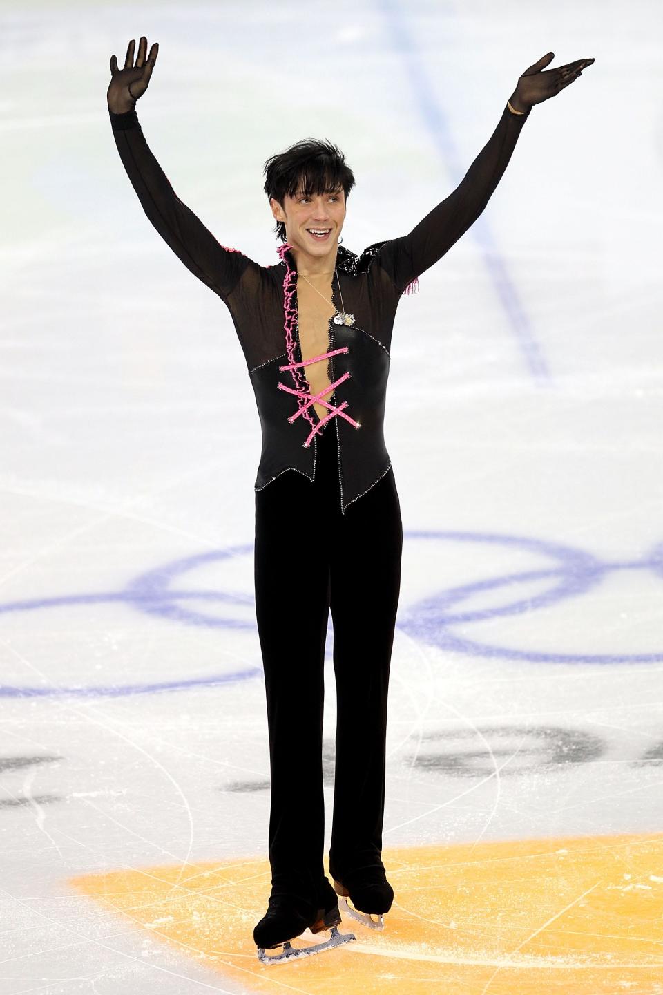 Johnny Weir wearing a corseted top at the olympics in 2010.