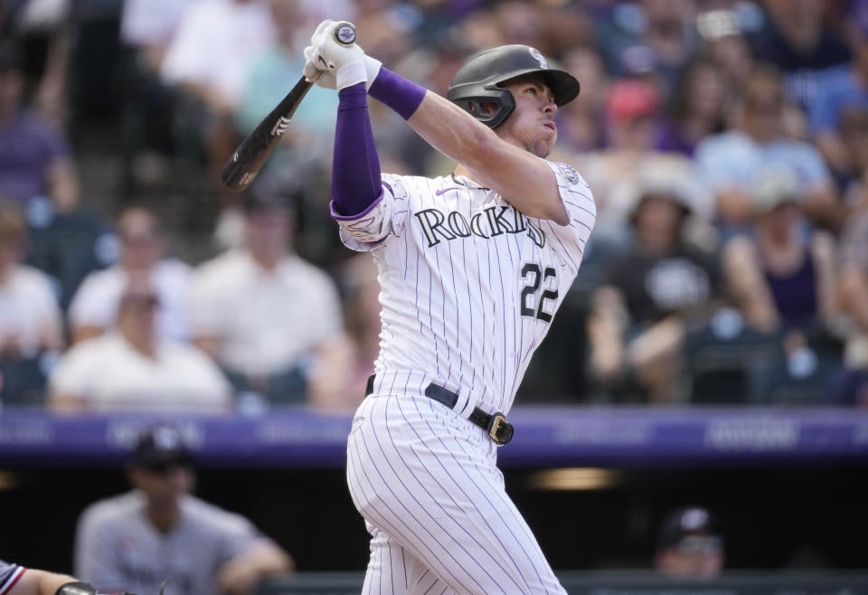 Colorado Rockies' Nolan Jones follows the flight of his solo home run off Minnesota Twins starting pitcher Bailey Ober in the fourth inning of a baseball game, Sunday, Oct. 1, 2023, in Denver. (AP Photo/David Zalubowski)