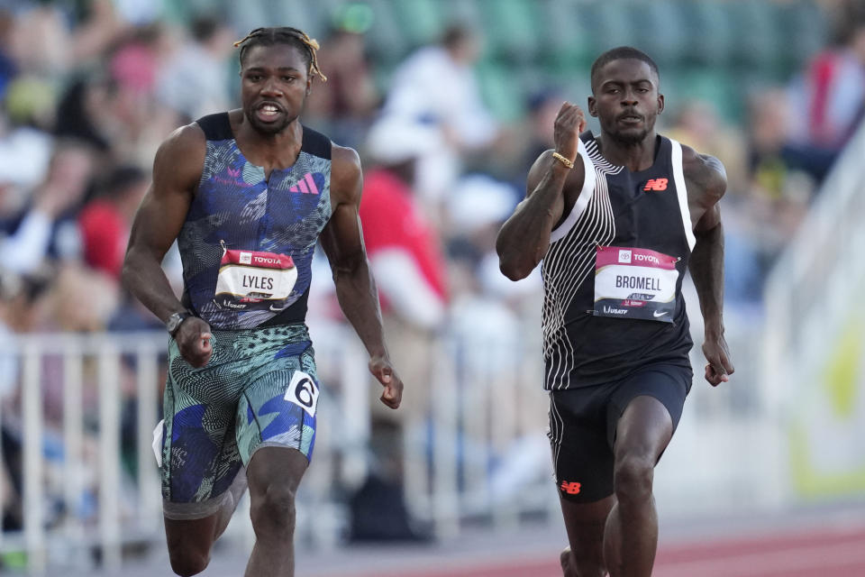 FILE - Noah Lyles competes against Trayvon Bromell in the men's 100 meter semi-finals during the U.S. track and field championships in Eugene, Ore., Friday, July 7, 2023. (AP Photo/Ashley Landis, File)