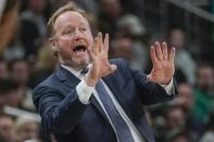 Milwaukee Bucks head coach Mike Budenholzer reacts during the first half of an NBA basketball game against the Boston Celtics Thursday, Jan. 16, 2020, in Milwaukee. (AP Photo/Morry Gash)
