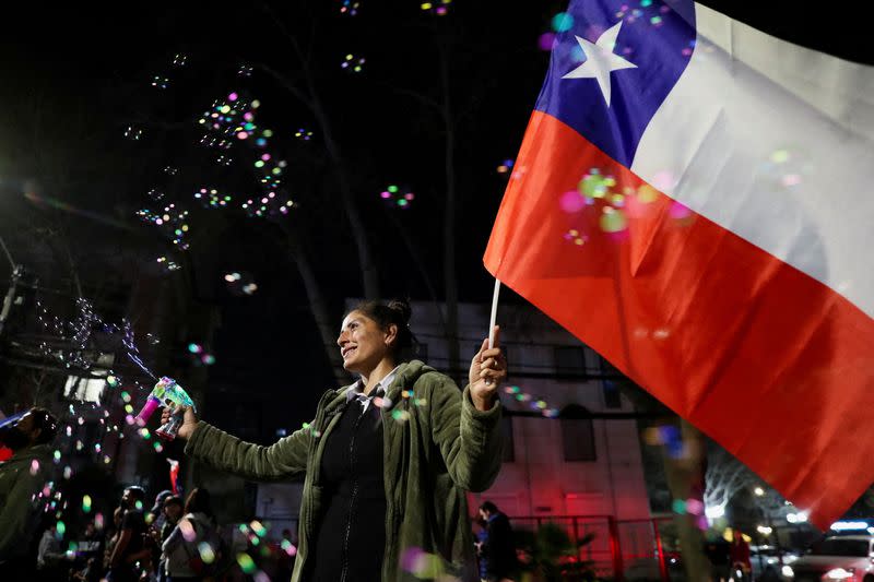 FILE PHOTO: Chileans vote in a mandatory plebiscite to approve or reject the new Constitution