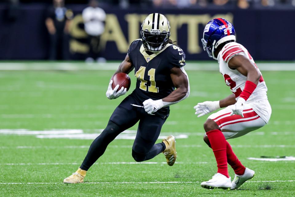 New Orleans Saints running back Alvin Kamara (41) rushes against New York Giants during the second half at Caesars Superdome.