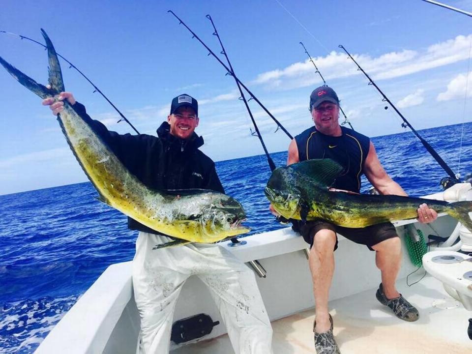 Crew and anglers aboard the Captain Easy charter boat docked out of the Post Card Inn hold a couple of nice mahi they caught in June 2017. Charter captains say they now have difficulty finding large dolphin off the Florida Keys.