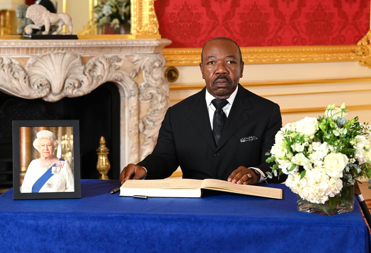 Ali Bongo signs a book of condolence for the late Queen at Lancaster House (Getty Images)