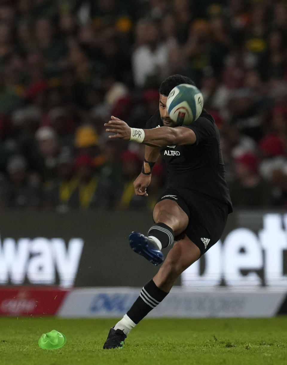 New Zealand's Richie Mo'unga kicks a penalty during the Rugby Championship test between South Africa and New Zealand at Ellis Park Stadium in Johannesburg, South Africa, Saturday, Aug. 13, 2022. (AP Photo/Themba Hadebe)