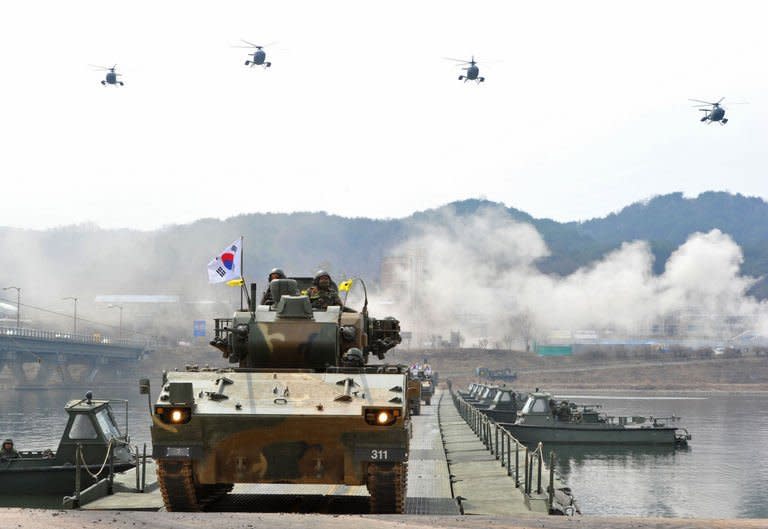 South Korean anti-aircraft armoured vehicles take part in a military drill in Hwacheon near the border with North Korea on April 1, 2013. The United States has positioned a destroyer off the coast of South Korea to defend against a possible missile strike, a US official said, as the South vowed a strong response to any provocation from the North