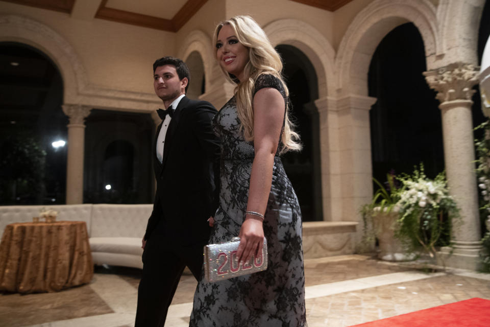 Tiffany Trump, the daughter of President Donald Trump, arrives for a New Year's Eve party at the president's Mar-a-Lago property, Tuesday, Dec. 31, 2019, in Palm Beach, Fla. (AP Photo/ Evan Vucci)