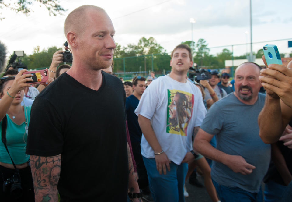 People chant at a man who left the Richard Spencer event at the University of Florida.&nbsp;