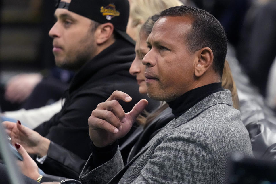 Alex Rodriguez, an owner of the Minnesota Timberwolves, watches play between the Boston Celtics and the Timberwolves during the first half of an NBA basketball game Wednesday, Jan. 10, 2024, in Boston. (AP Photo/Charles Krupa)