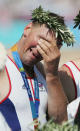 A tearful Matthew Pinsent of Great Britain stands on the podium during the medal ceremony for the men's four event on August 21, 2004 during the Athens 2004 Summer Olympic Games at the Schinias Olympic Rowing and Canoeing Centre in Athens, Greece. (Photo by Shaun Botterill/Getty Images)