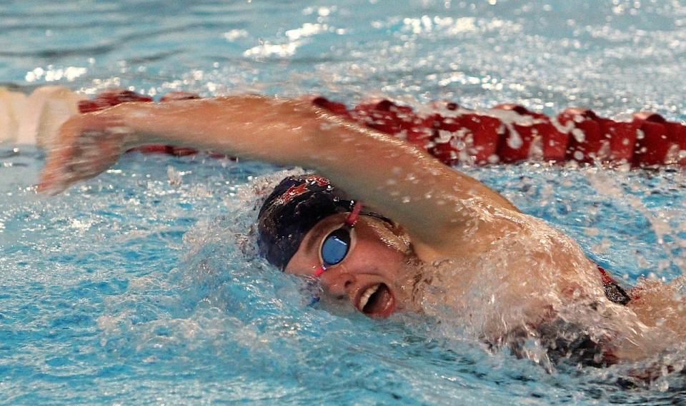 BNL junior Emma Gabhart cuts through the water during a relay win against Edgewood. Gabhart finished 14th in the state last year in the 200-yard individual medley.