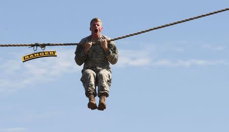 A U.S. Army Ranger shows skills during a demonstration at Ranger school graduation at Fort Benning in Columbus, Georgia in this August 21, 2015, file photo. REUTERS/Tami Chappell/Files