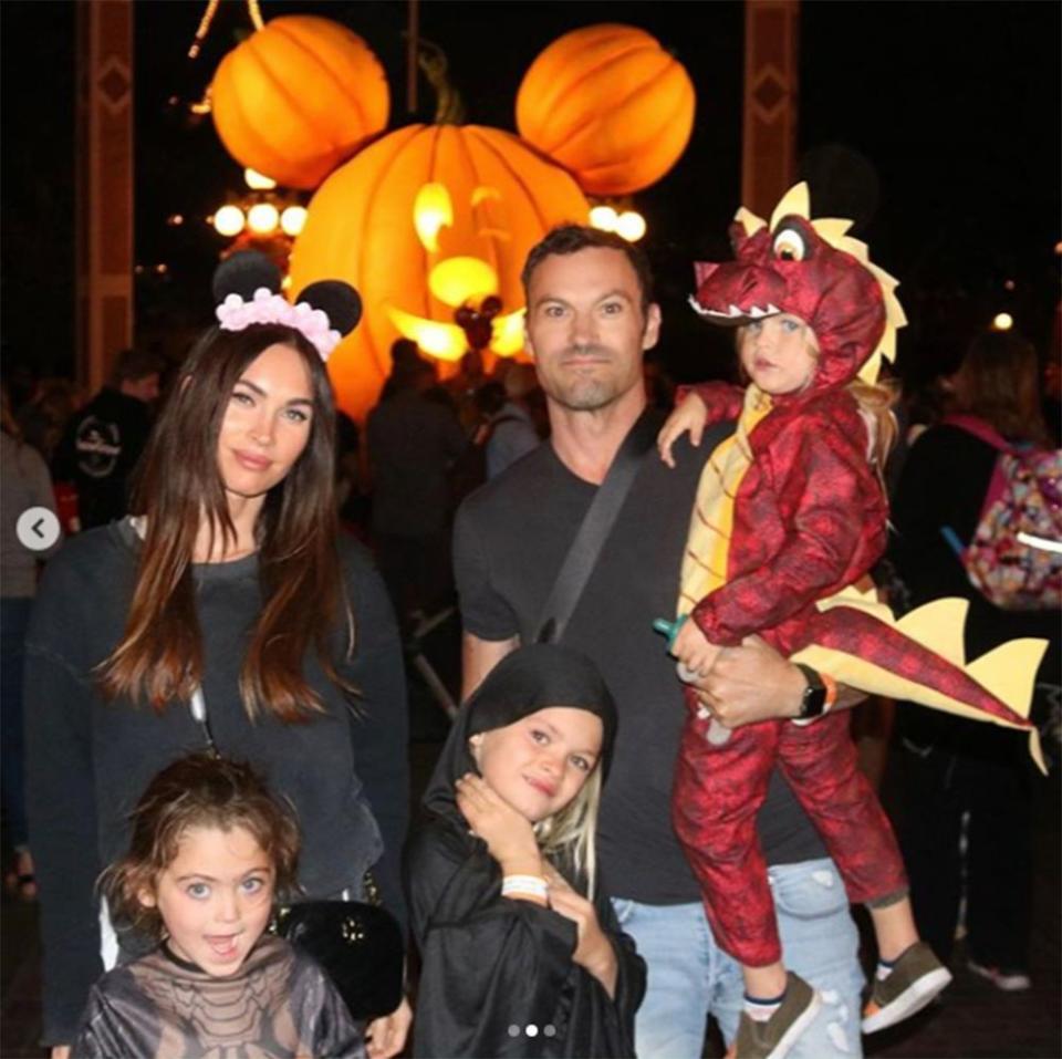 Megan Fox (L) and Brian Austin Green with their kids