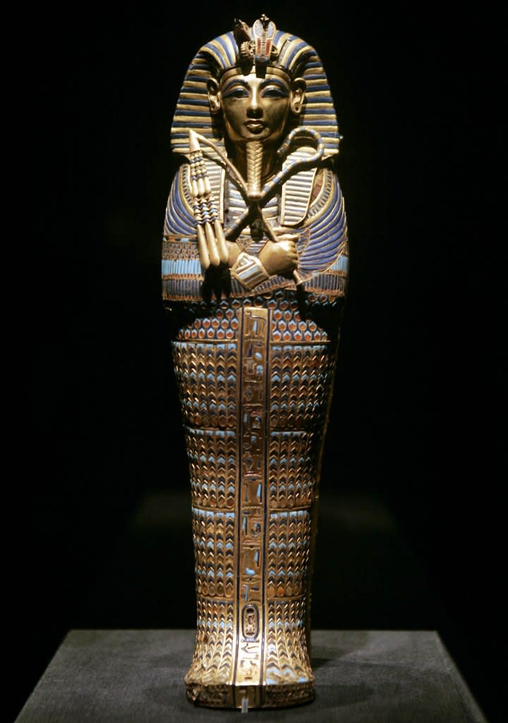 The “Coffinette for the Viscera of Tutankhamun,” which contained the king’s mummified liver, depicts him as Osiris, holding a crook and flail. AP