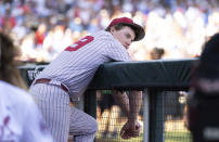 Oklahoma closing pitcher Trevin Michael watches as Mississippi celebrates their 4-2 win in Game 2 of the NCAA College World Series baseball finals, Sunday, June 26, 2022, in Omaha, Neb. Mississippi defeated Oklahoma 4-2 to win the championship. (AP Photo/Rebecca S. Gratz)