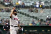 Boston Red Sox pitcher Kenley Jansen celebrates after striking out Oakland Athletics' Ryan Noda to end a baseball game Wednesday, April 3, 2024, in Oakland, Calif. The Red Sox won 1-0. (AP Photo/Godofredo A. Vásquez)