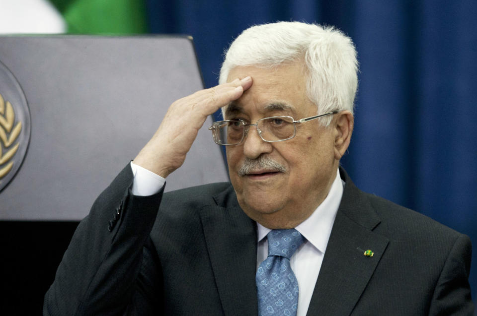 Palestinian President Mahmoud Abbas gestures during a meeting with Jordanian Prime Minister Abdullah Ensour, in the West Bank city of Ramallah, Wednesday, April 23, 2014. (AP Photo/Majdi Mohammed)