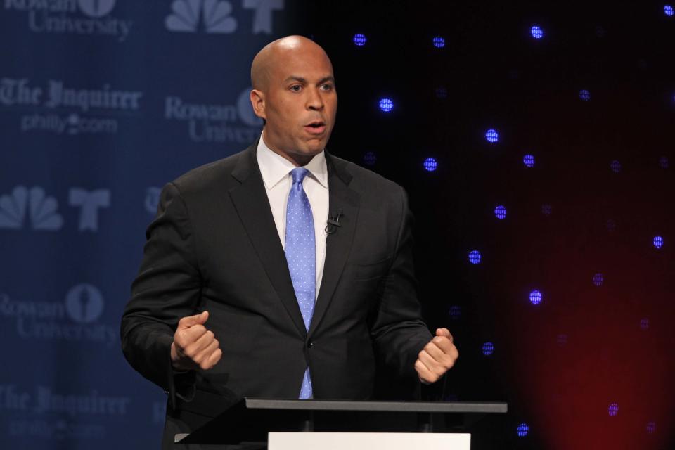 U.S. Senate candidate Cory Booker gestures during the second televised debate at Rowan University in Glassboro, N.J., Wednesday Oct. 9, 2013. (AP Photo/Philadelphia Inquirer, Michael Bryant, Pool)